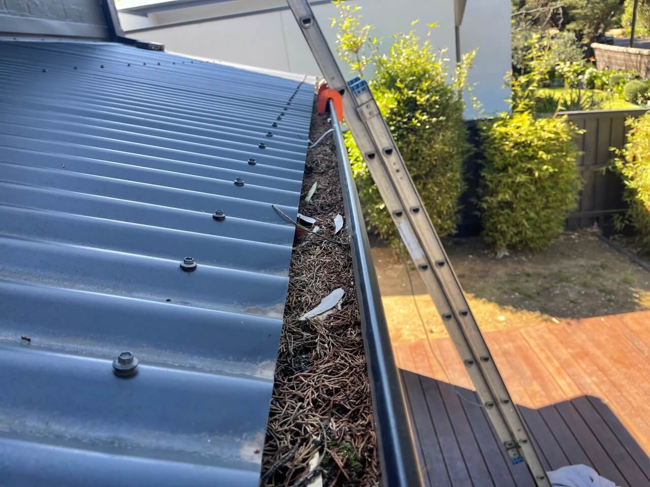 How To Clean Your Gutter Guards Without Climbing A Ladder